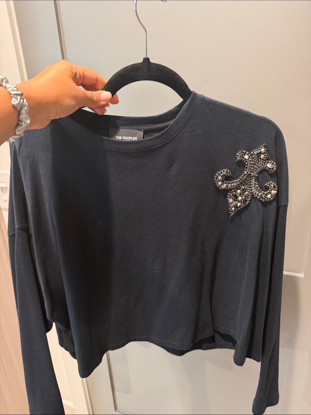 The Kooples Black Long-Sleeve Crewneck Top with Beaded Shoulder Appliqué